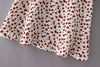 Jupe courte Grainne rouge imprimé floral détails du motif